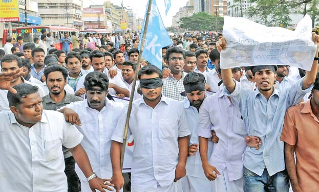 KSU and Bajrang Dal activists taking out protest against the Kiss of Love in Kochi. (Photo: ARUNCHANDRA BOSE) KSU and Bajrang Dal activists taking out protest against the Kiss of Love in Kochi. (Photo: ARUNCHANDRA BOSE)